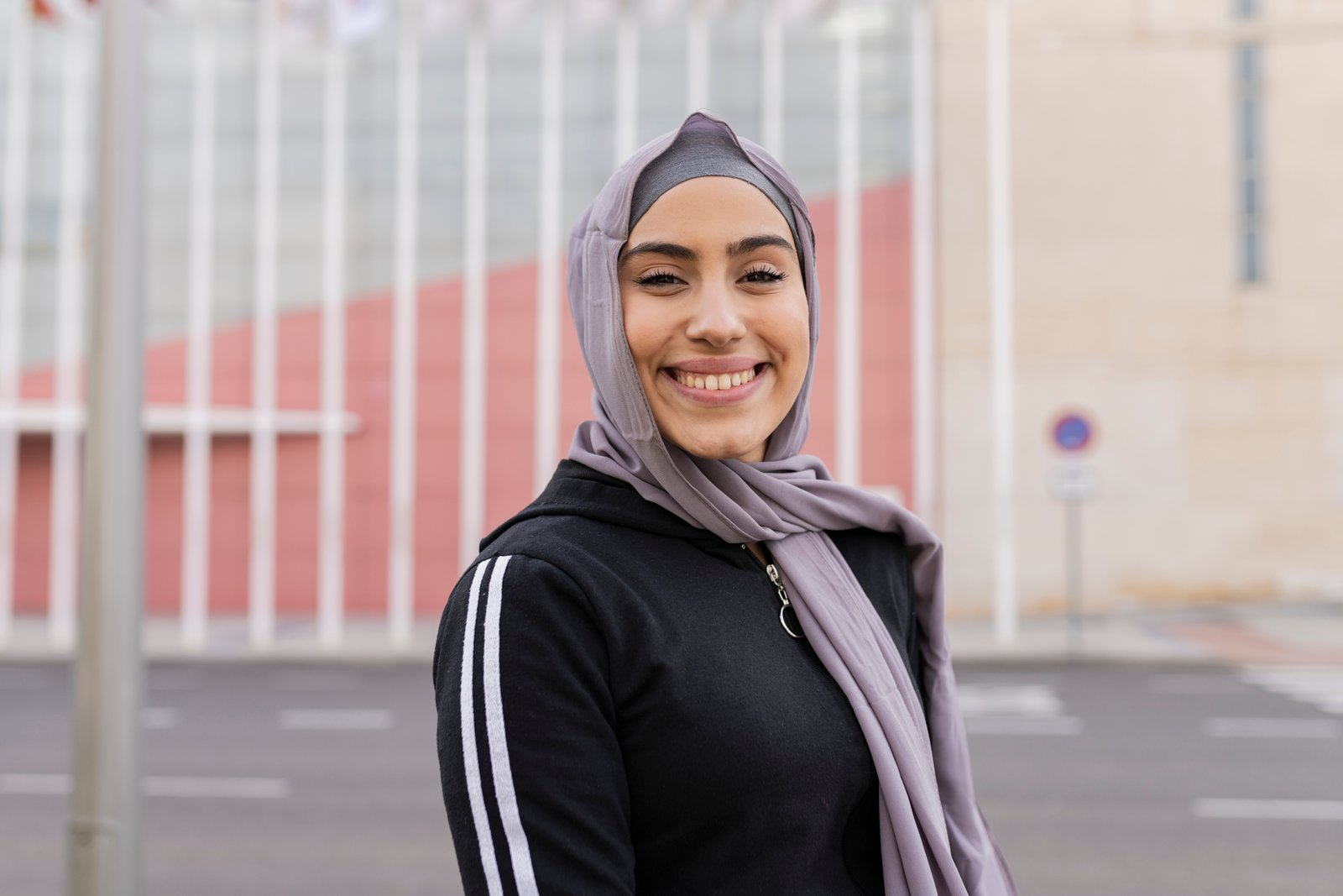 portrait Beautiful young woman in hijab and sportswear, sporty Muslim woman